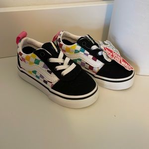 Multi colored checkered toddler vans . New
